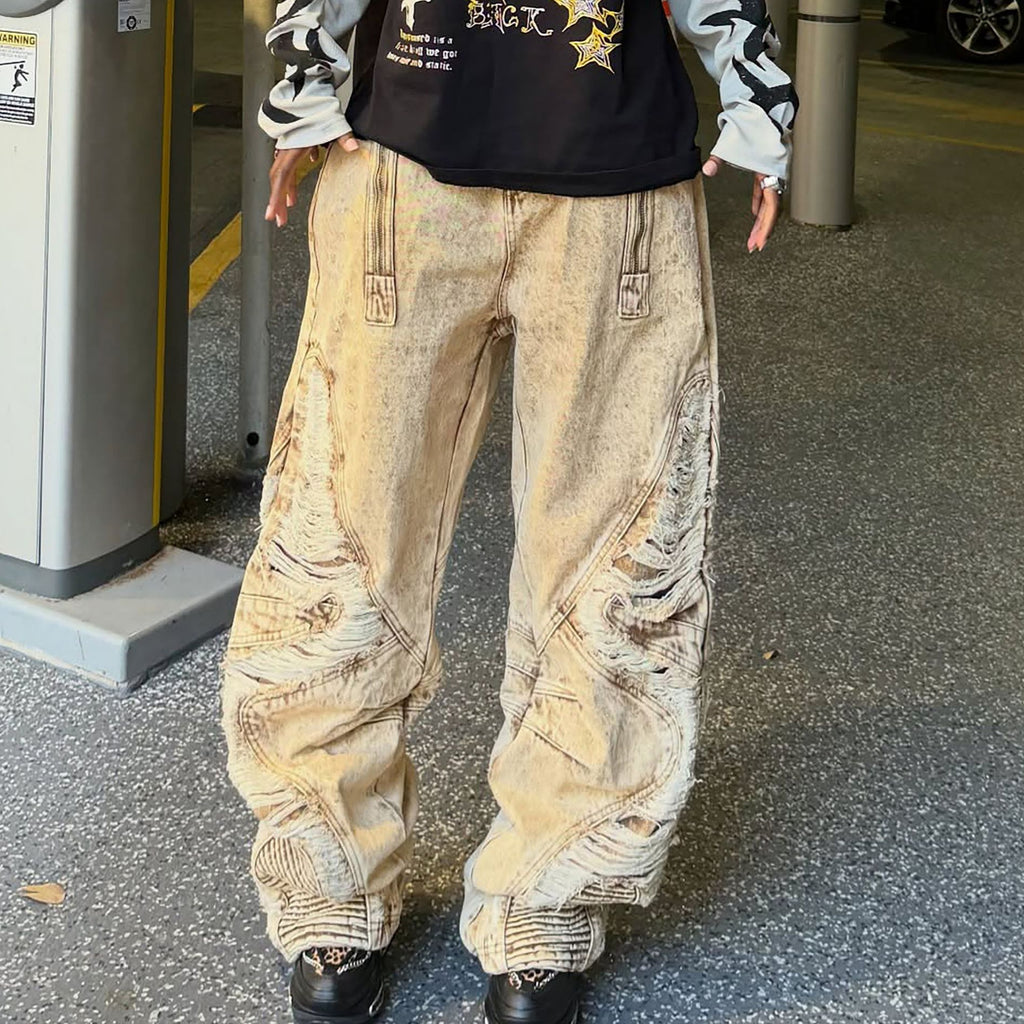 Heavily Distressed Irregular Ripped Knife-Edge Jeans