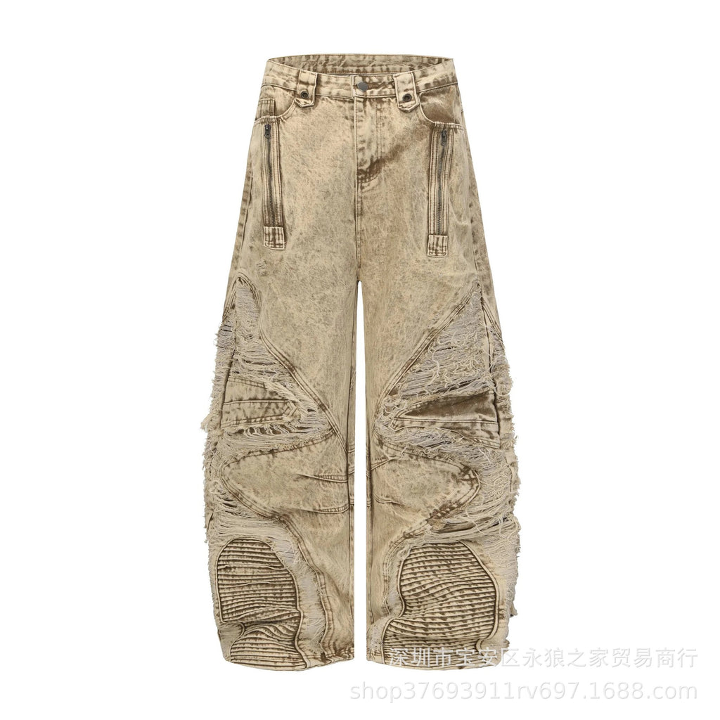Heavily Distressed Irregular Ripped Knife-Edge Jeans